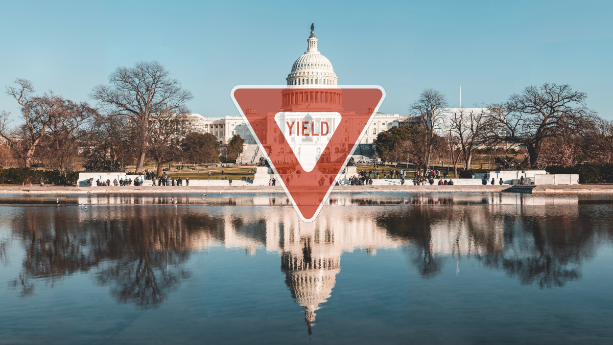 picture of the us capital building with a yield sign embossed on top
